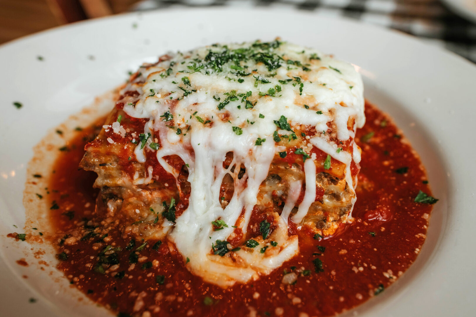 Fresh, cheesy lasagna at Buckhead Pizza Co. in Atlanta, Ga
